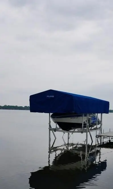 boat covered in blue wrap