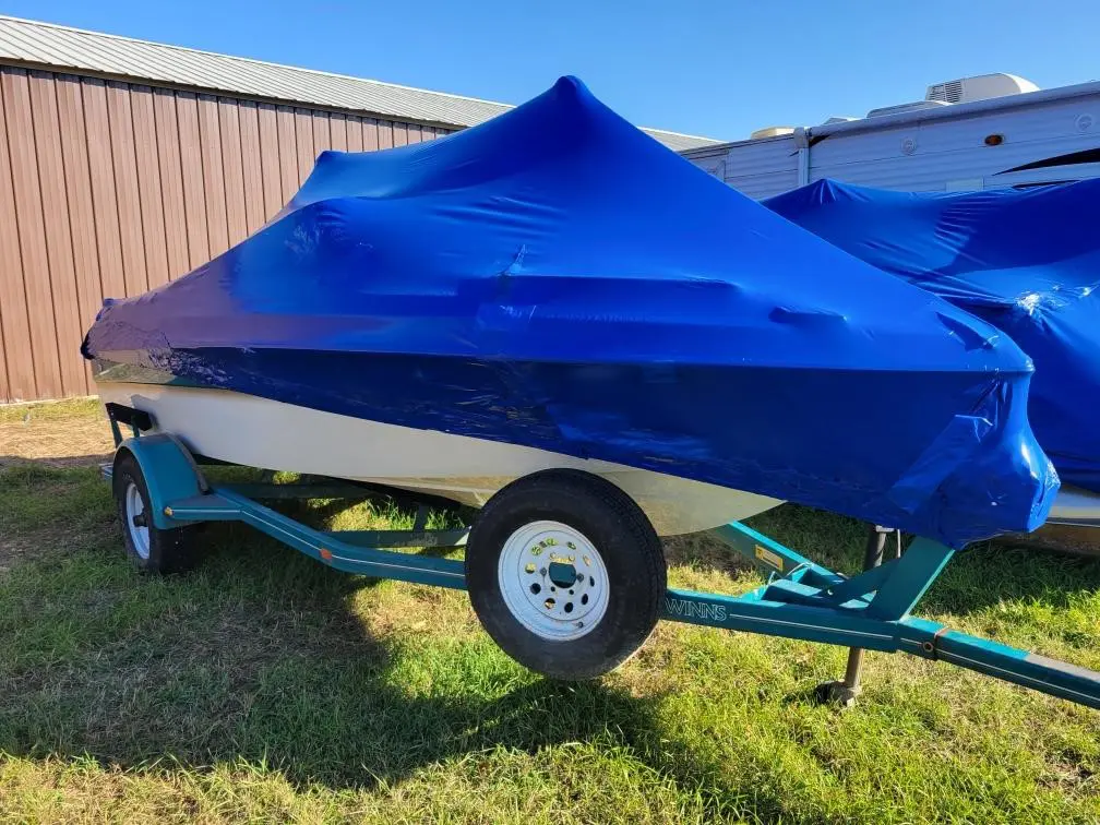 boat covered in blue wrap