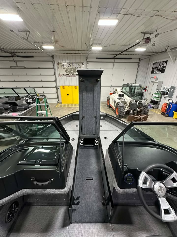 Boat center console in indoor workshop