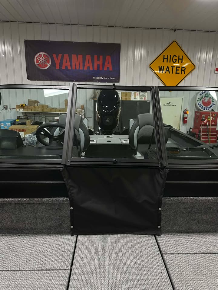 Boat cockpit with Yamaha banner and motor