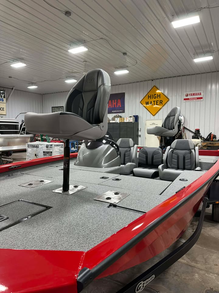 Red bass boat deck with pedestal seats