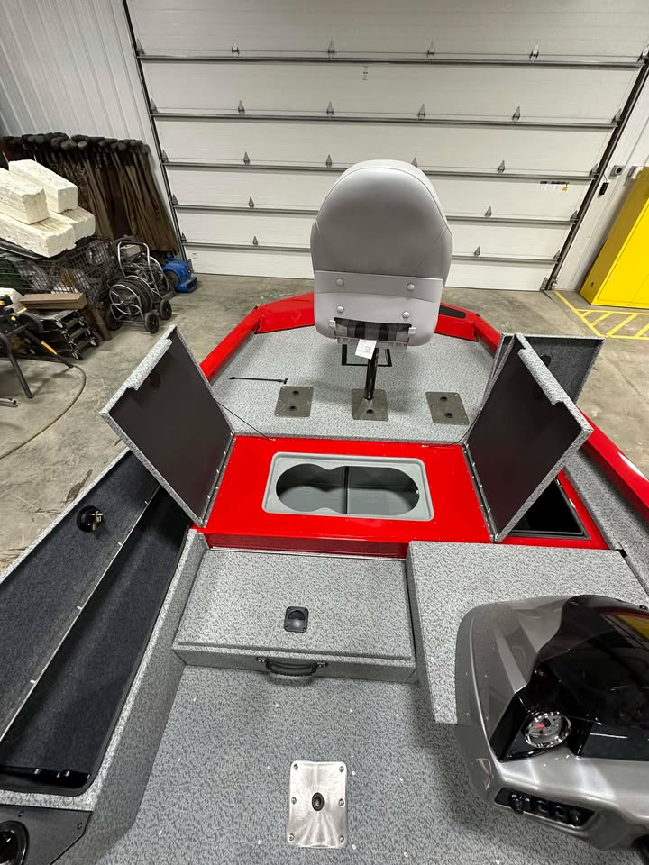 Fishing boat bow with pedestal seat and hatches
