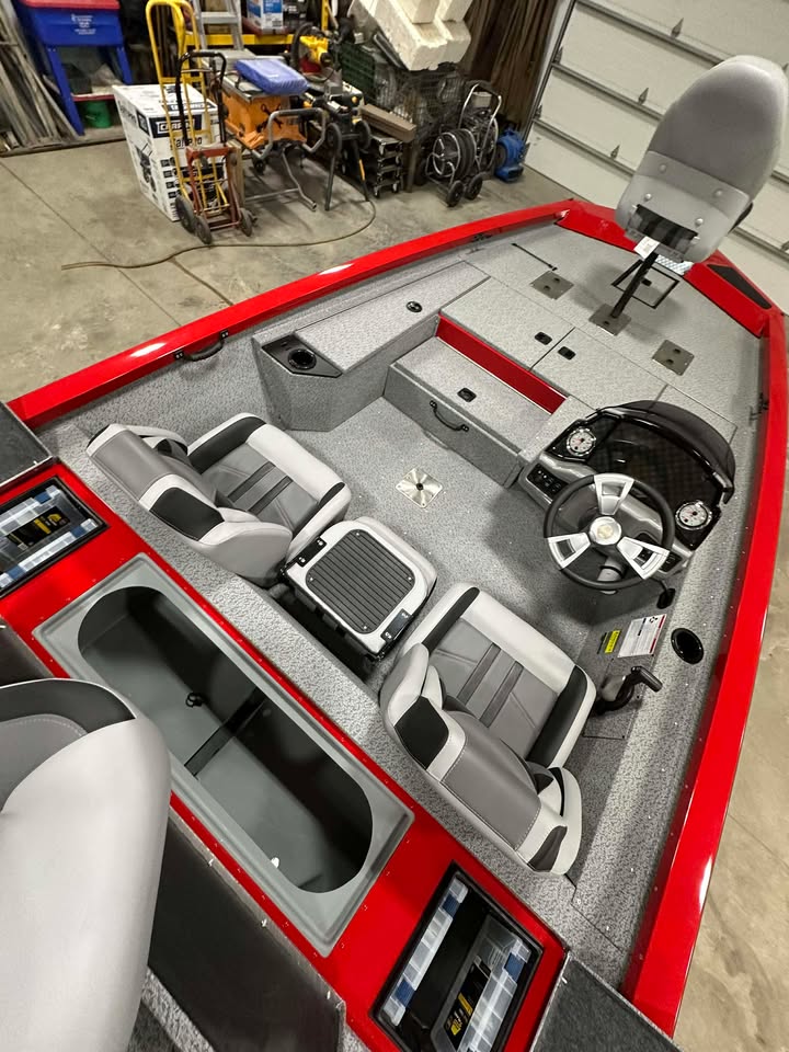 Red bass boat interior with gray seats