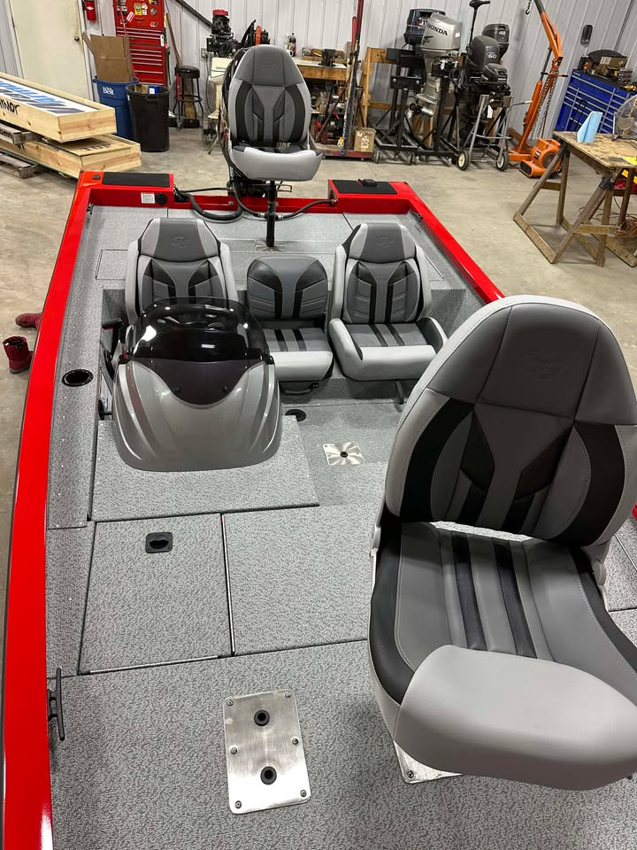 Red bass boat interior with gray seats