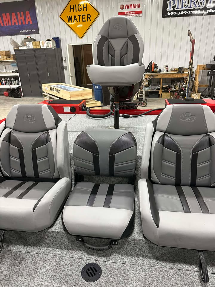 Gray fishing boat seats with pedestal chair