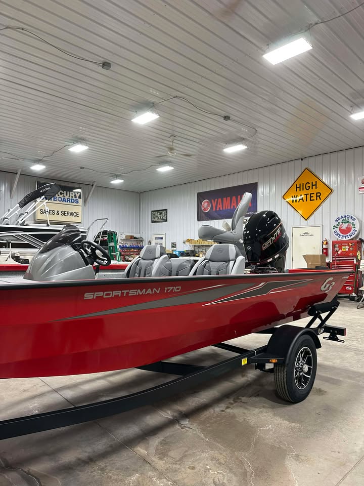 Red Sportsman 1710 boat in showroom