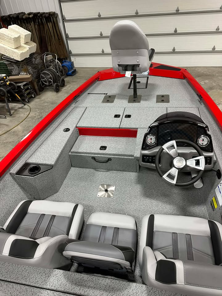 Red bass boat interior with steering console
