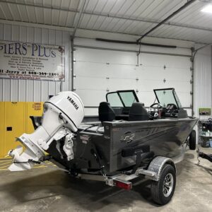 Black aluminum fishing boat with Yamaha outboard