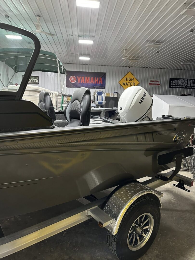 Aluminum fishing boat on trailer with Yamaha outboard