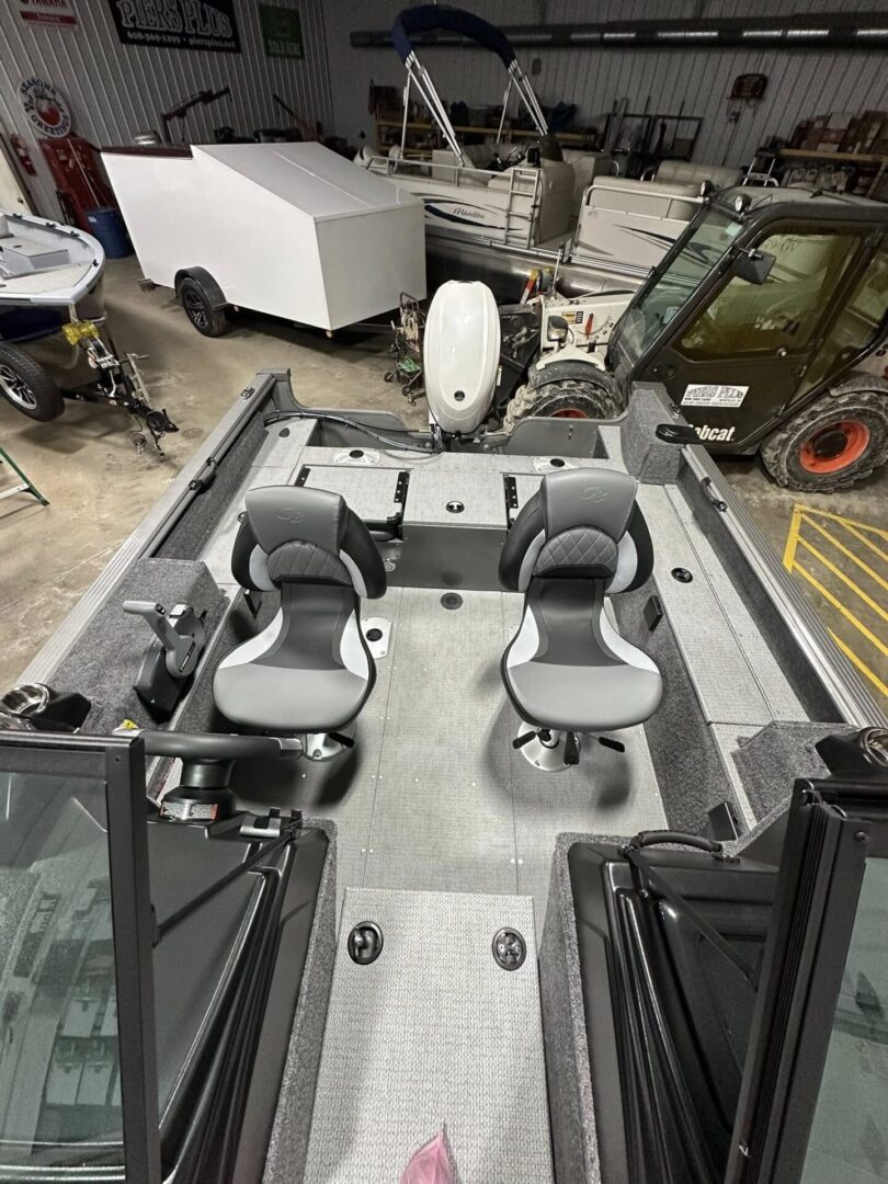 Fishing boat deck interior with two swivel seats