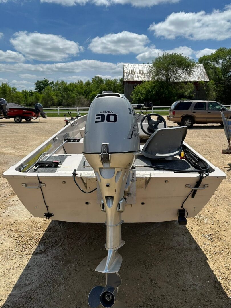 Aluminum fishing boat with Honda outboard motor